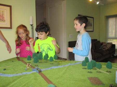 And more fighting. Jack (right) stands with 2 of his friends. The girl won with 3 coins.